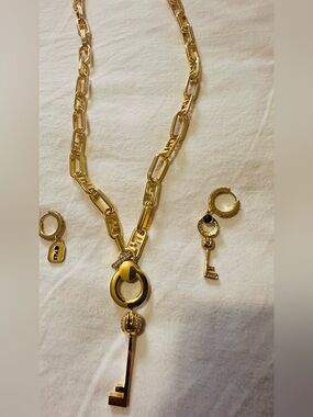 Sale‼️Gold Key Pendant Necklace and asymmetrical Hoop Earrings - inspired